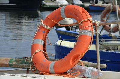 High angle view of life belt at harbor