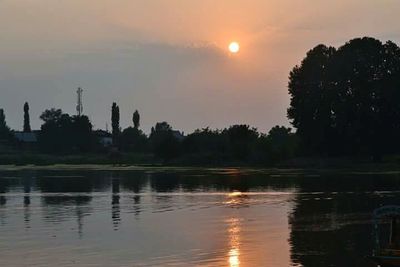 Scenic shot of calm sea at sunset