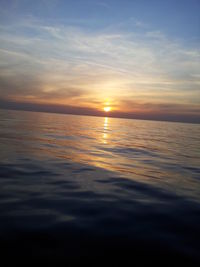 View of calm sea at sunset