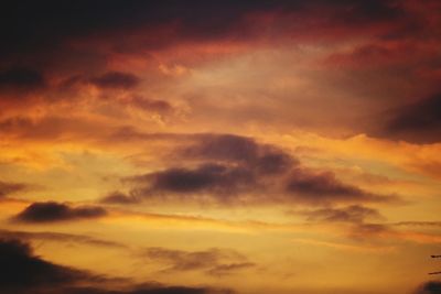 Low angle view of dramatic sky during sunset