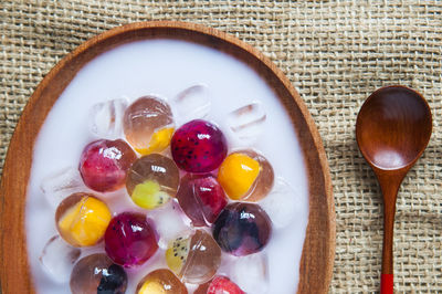 Directly above shot of fruit jelly dessert served in plate on table