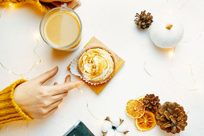 High angle view of woman with food on table