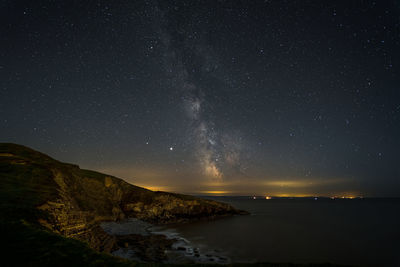 Scenic view of star field against sky at night
