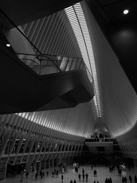 People in illuminated room oculus new york 