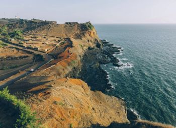 High angle view of coastal feature by calm sea