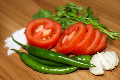 Close-up of chili peppers on table