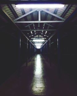 Illuminated corridor of building