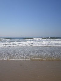 Scenic view of sea against clear sky