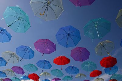 Low angle view of multi colored balloons