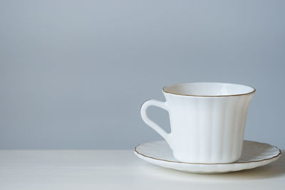 Close-up of coffee cup on table