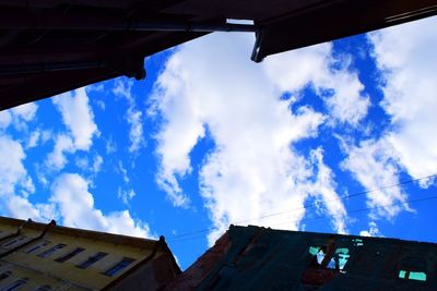 Low angle view of houses against sky