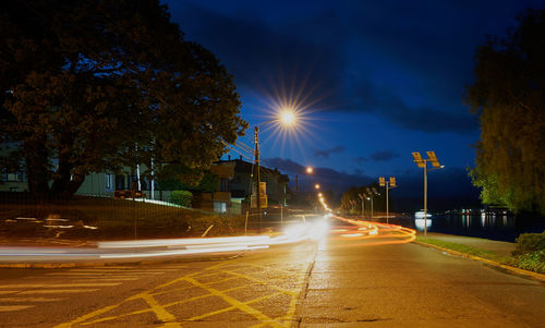 Light trails on street at night