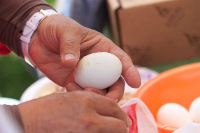 Close-up of man preparing food