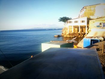 Scenic view of sea against clear blue sky