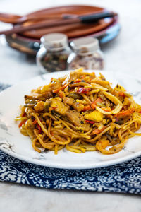 Close-up of spaghetti served in plate