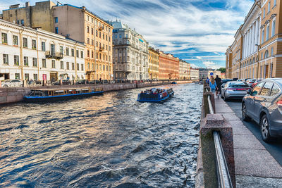 Canal passing through city buildings