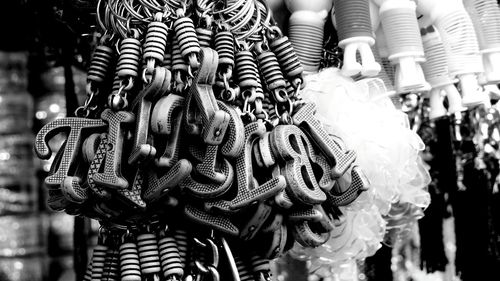 Close-up of key rings for sale at market
