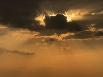 Scenic view of dramatic sky during sunset