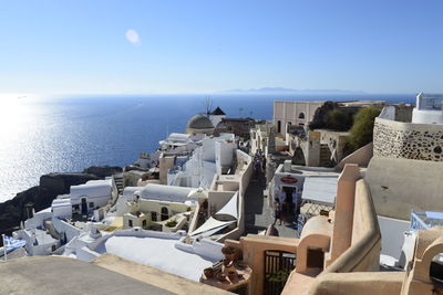 View of cityscape against sea