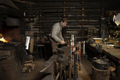 Blacksmith working on an anvil