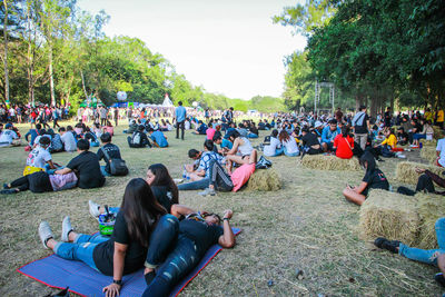 Group of people relaxing in park