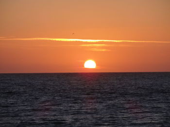 Scenic view of sunset over sea