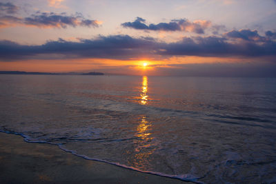 Scenic view of sea against sky during sunset