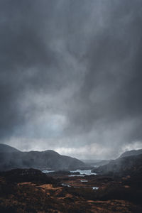 Scenic view of landscape against cloudy sky