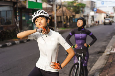 Female cyclist on road