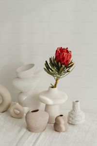 Close-up of wedding rings on table