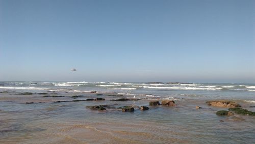 Scenic view of sea against clear sky