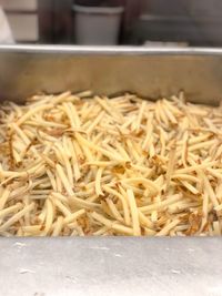 High angle view of noodles in container on table