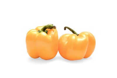 Close-up of yellow bell pepper against white background