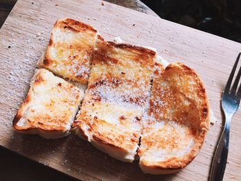 Close-up of bread on cutting board