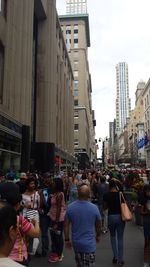 People walking on city street