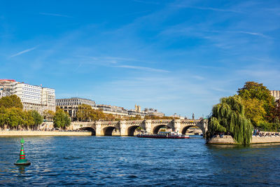 Bridge over river against sky