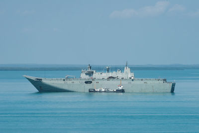 View of ship in sea against sky