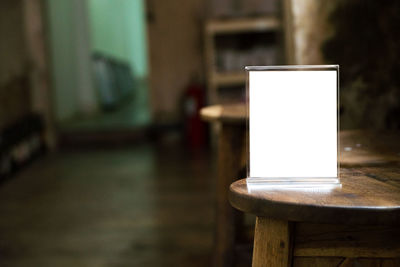 Close-up of empty chair on table