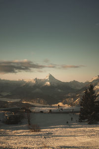 Scenic view of mountains against sky during sunset