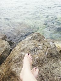 Low section of woman on beach