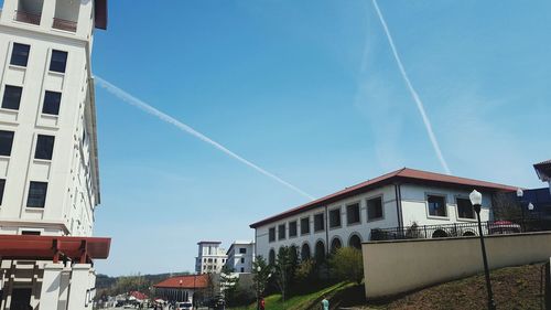 Low angle view of building against blue sky