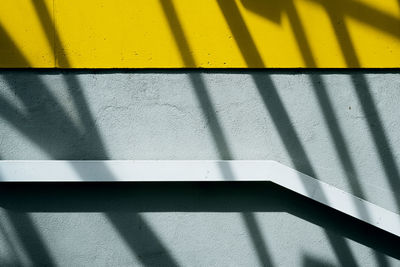 High angle view of shadow on wall