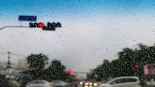 Road seen through wet windshield