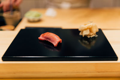 Close-up of sushi served on table