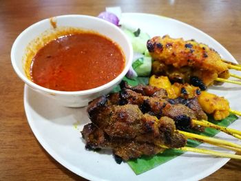 Close-up of served food in plate