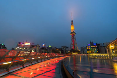 Illuminated buildings in city at night