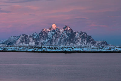 Scenic view of lofoten archipelago against sky during sunset