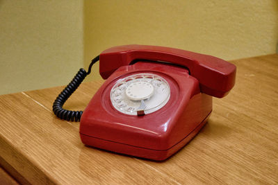 High angle view of telephone on table