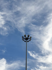 Low angle view of street light against sky