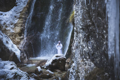 Scenic view of waterfall in forest